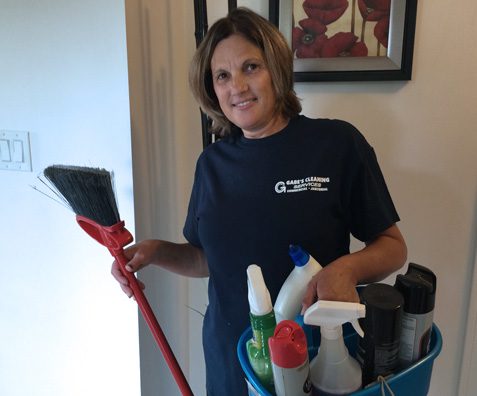 Gabe's Cleaning Services Worker Carrying Cleaning Equipments